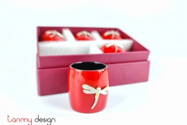Set of 6 red napkin rings attached with dragonfly